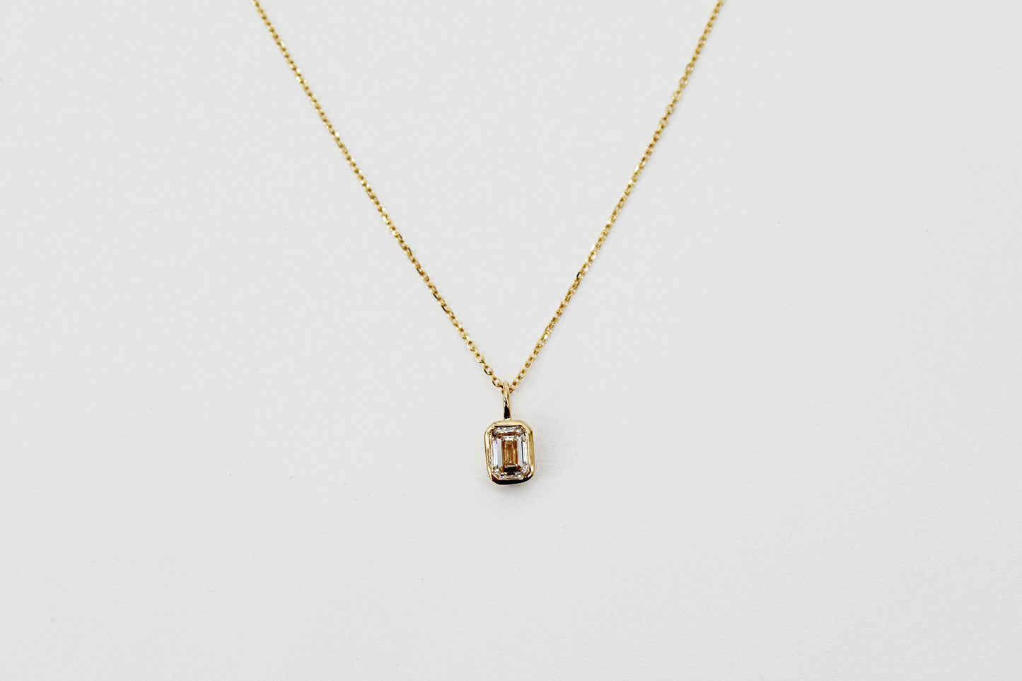 0.50Ct Lab Grown Emerald Cut Diamond Bezel Pendant