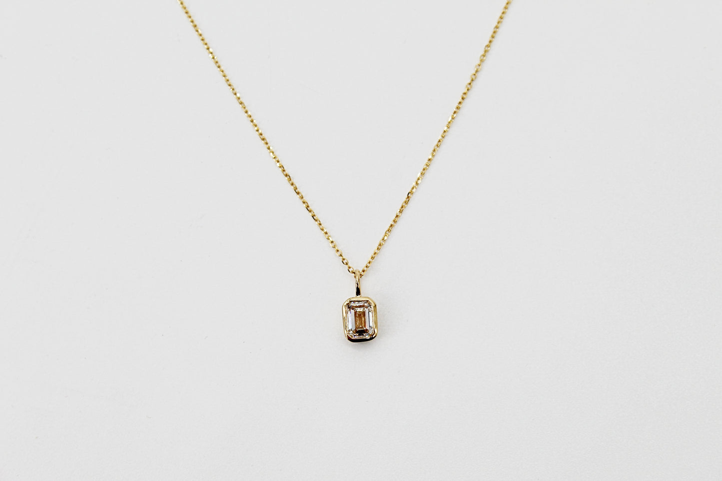 0.50Ct Lab Grown Emerald Cut Diamond Bezel Pendant