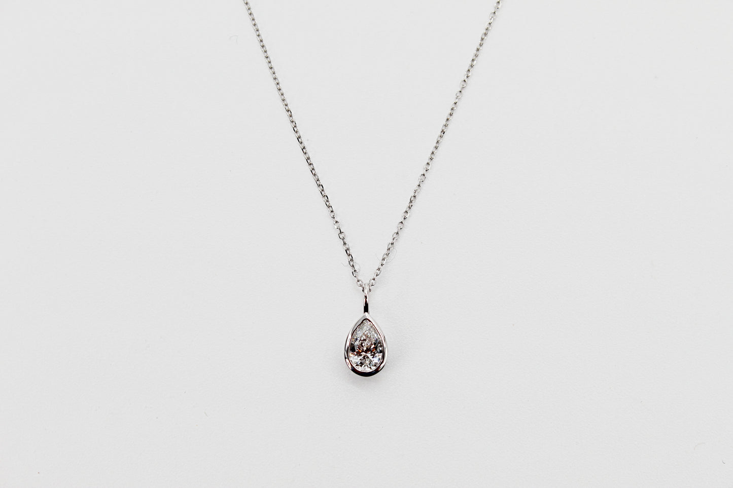 0.75Ct Lab Grown Pear Shaped Diamond Bezel Pendant