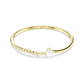 Mesmera Yellow Gold Tone Clear Stone Bangle