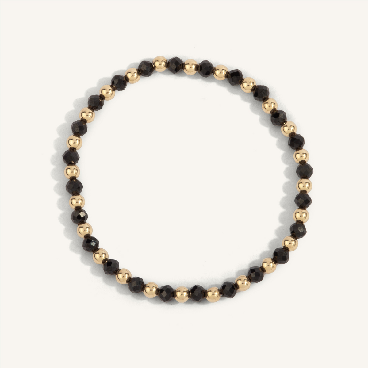 Black Spinel & Gold Bead Bracelet