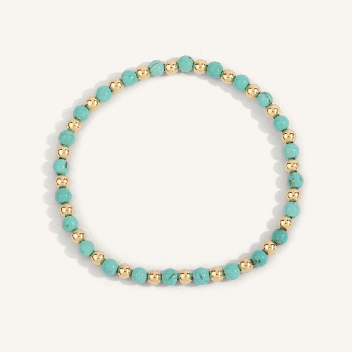 Blue Howlite & Gold Bead Bracelet